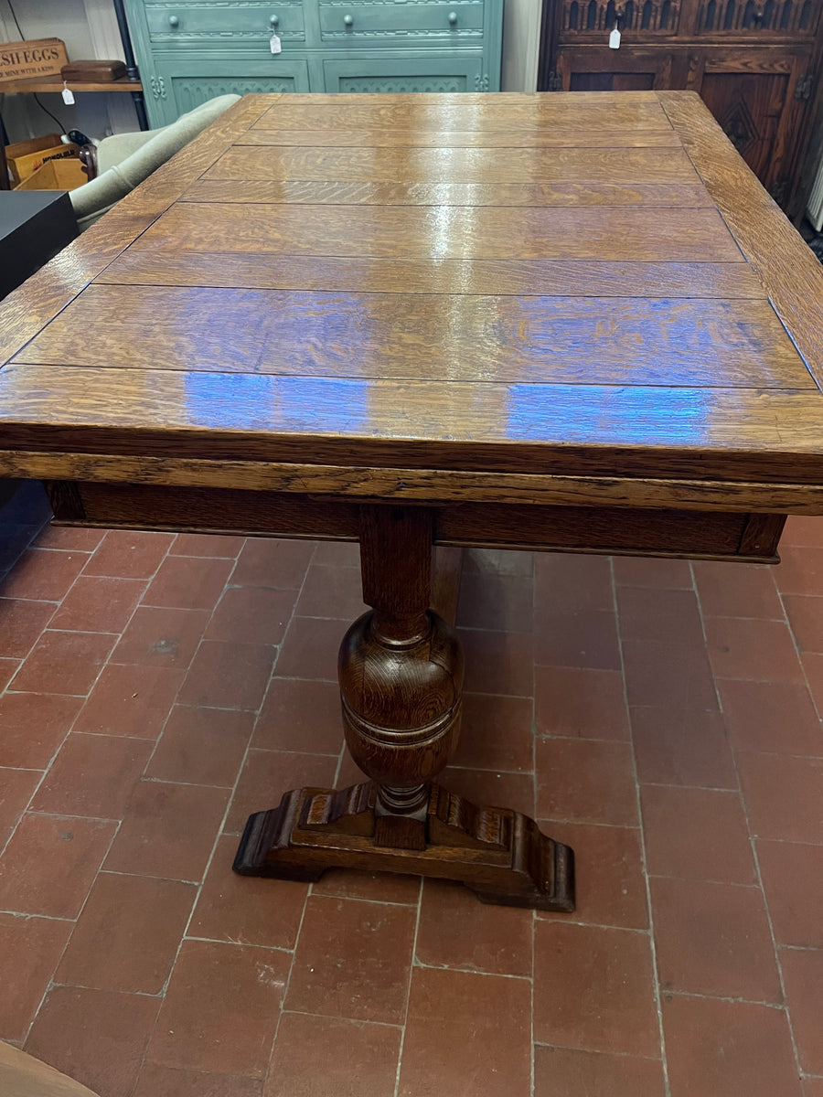 Antique Oak Solid Top Draw Leaf Dining Table and A Carved Base (SKU36)